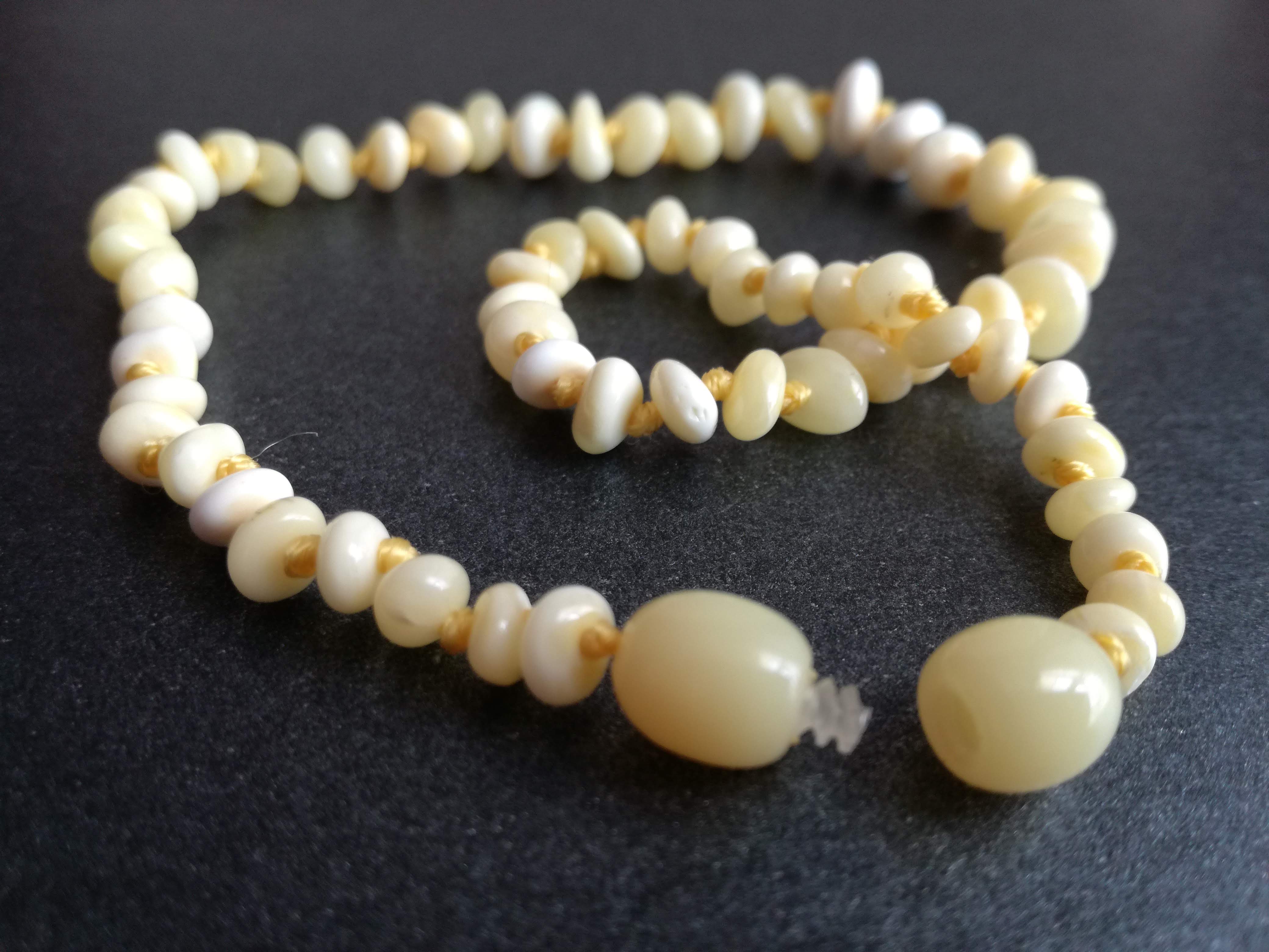 Baltic amber teething necklace, white and milky polished beads, premium product, limited edition, plastic screw clasp zoom, healing, succinic acid, genuine baltic amber, safe for babies and nursing mums, made in poland