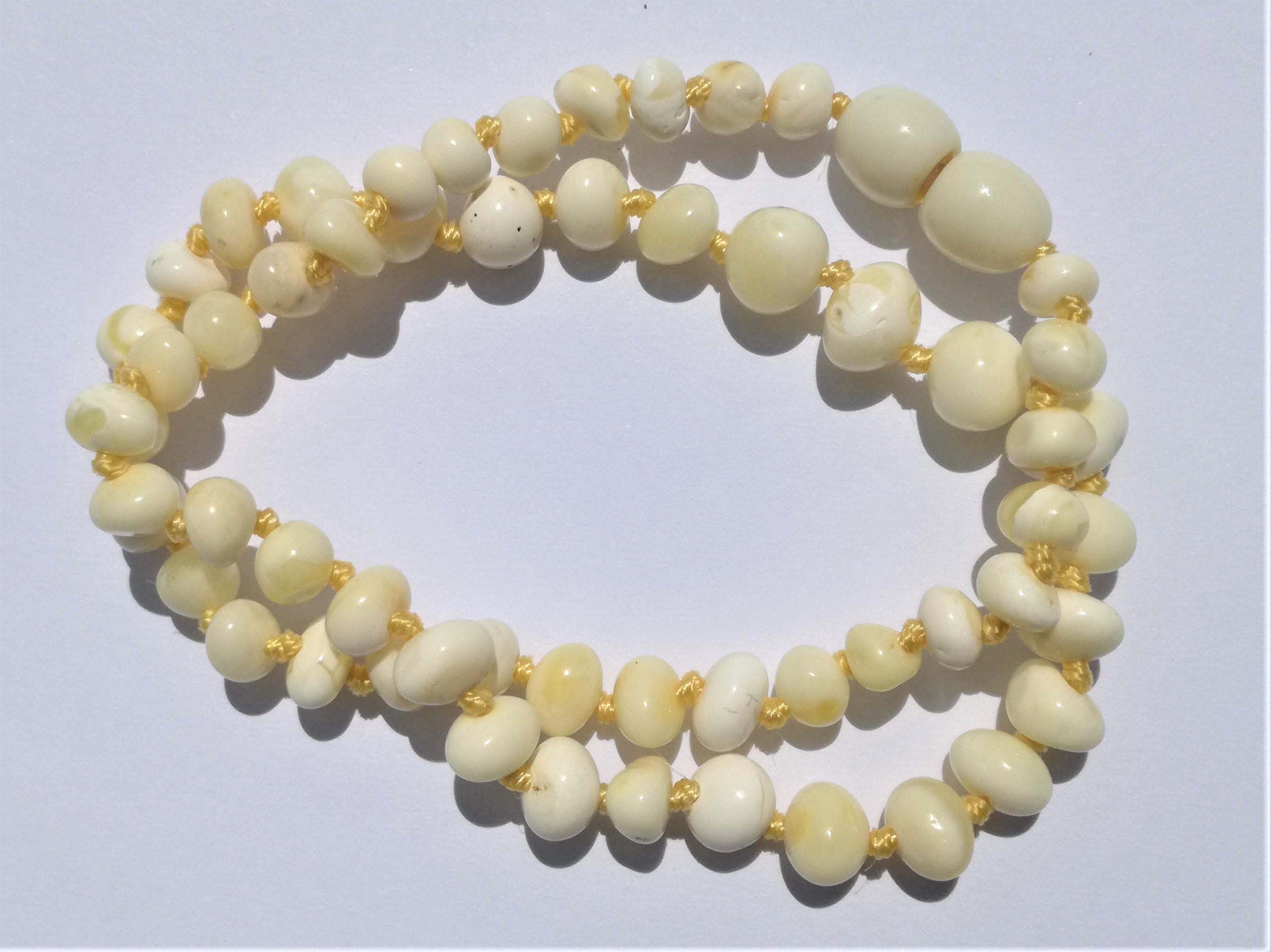 amber teething necklace, white polished beads,  premium product, limited edition, plastic screw clasp, healing, succinic acid, genuine baltic amber, safe for babies and nursing mums, made in poland