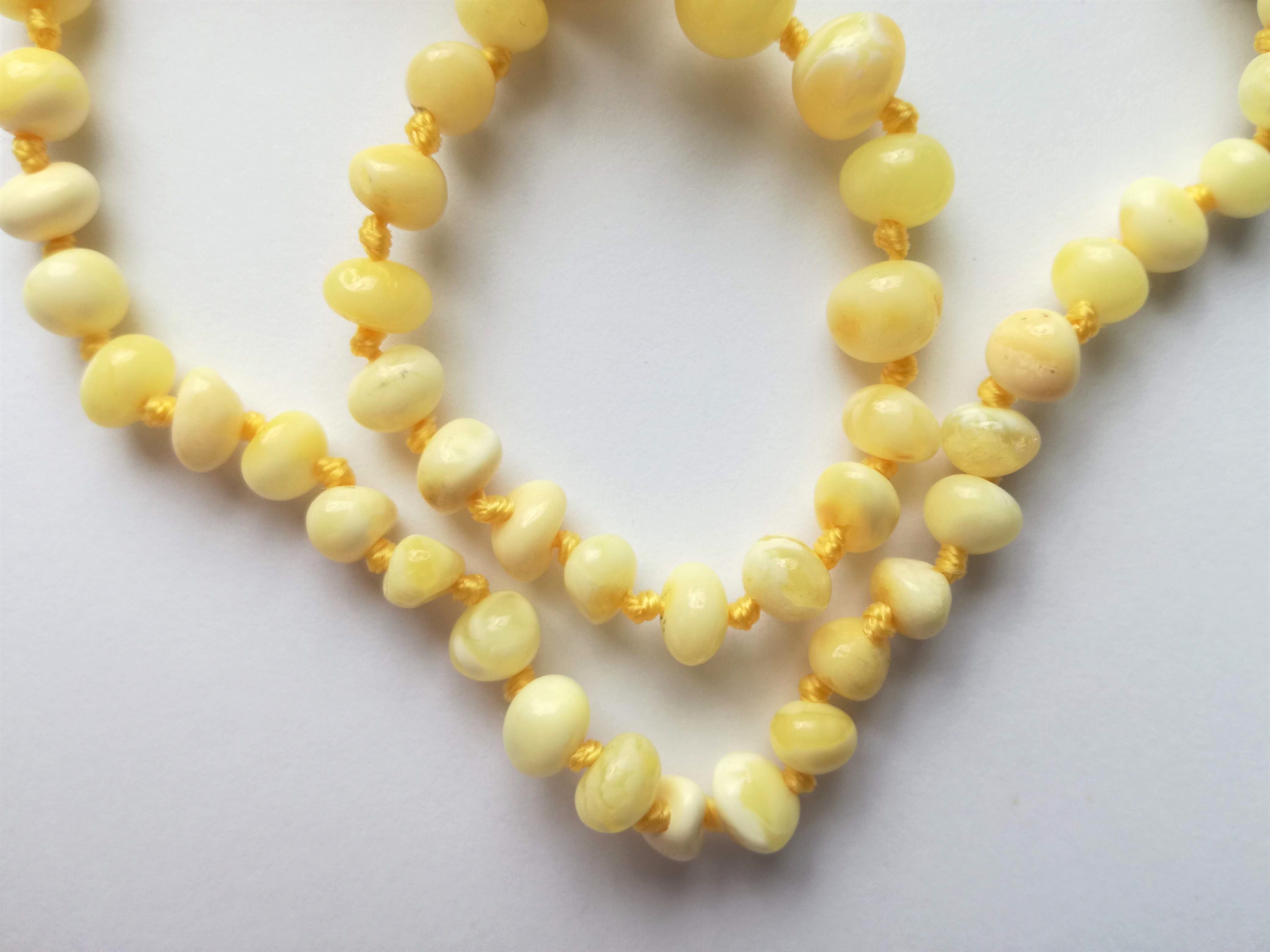 amber teething necklace, white and milky polished beads, premium product, limited edition, plastic screw clasp, healing, succinic acid, genuine baltic amber, safe for babies and nursing mums, made in poland, zoom